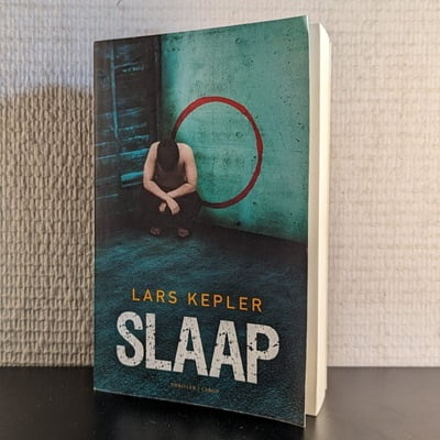 Cover van het tweedehands boek 'Slaap' door Lars Kepler, getoond in 400x400 pixels.
